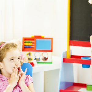 Child at speech therapy session.